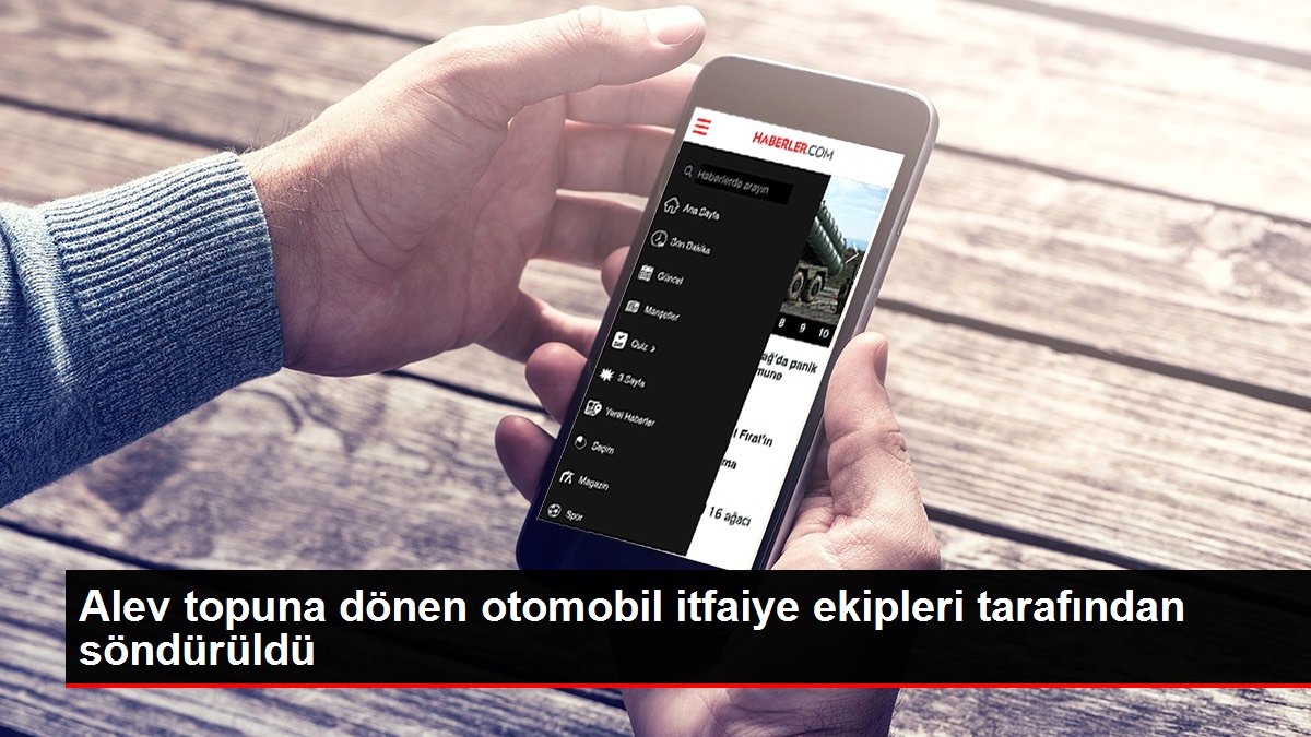 Alev topuna dönen otomobil itfaiye ekipleri tarafından söndürüldü