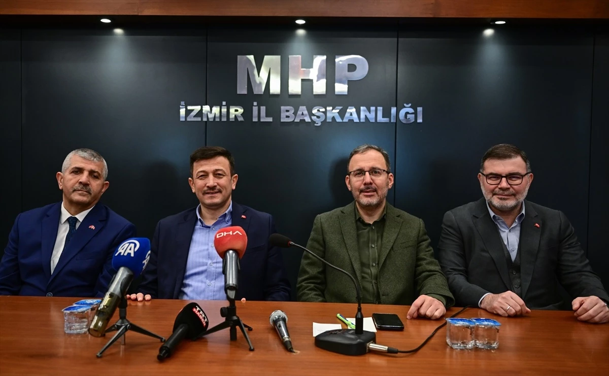 AK Parti İzmir Büyükşehir Belediye Başkan adayı Hamza Dağ, MHP İzmir İl Başkanlığını ziyaret etti