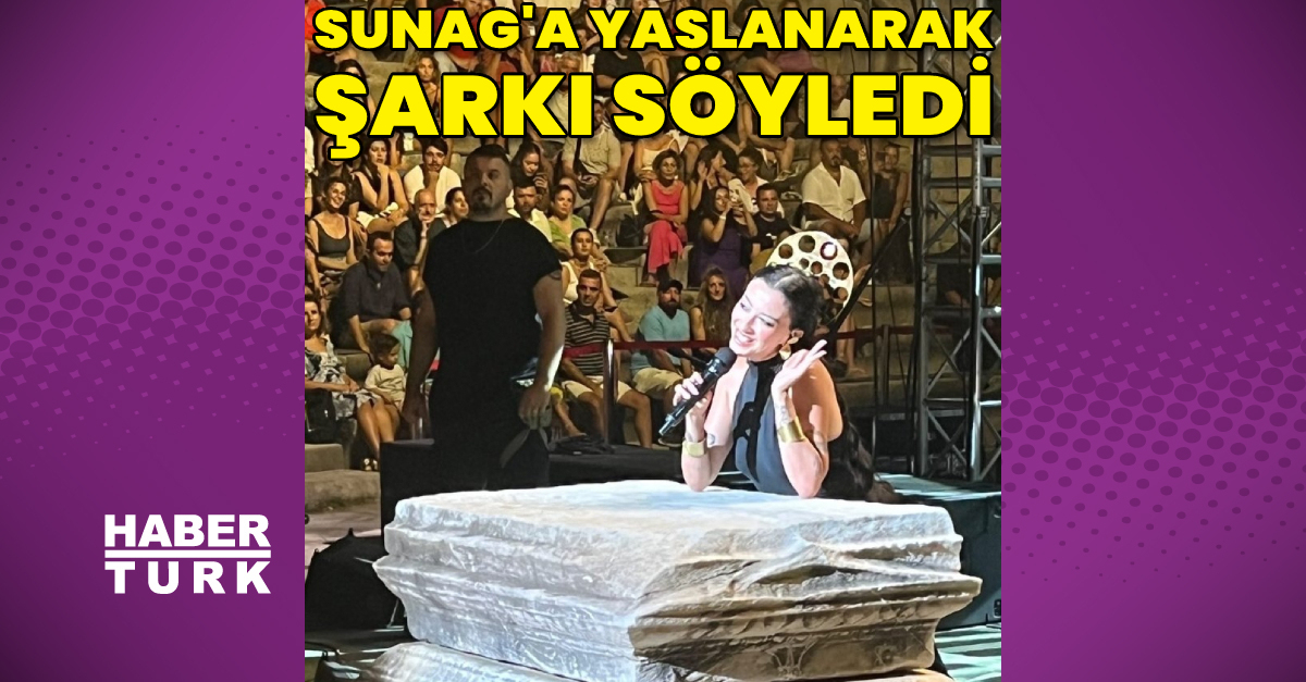 Melike Şahin, Sunag'a yaslanarak şarkı söyledi - Magazin haberleri