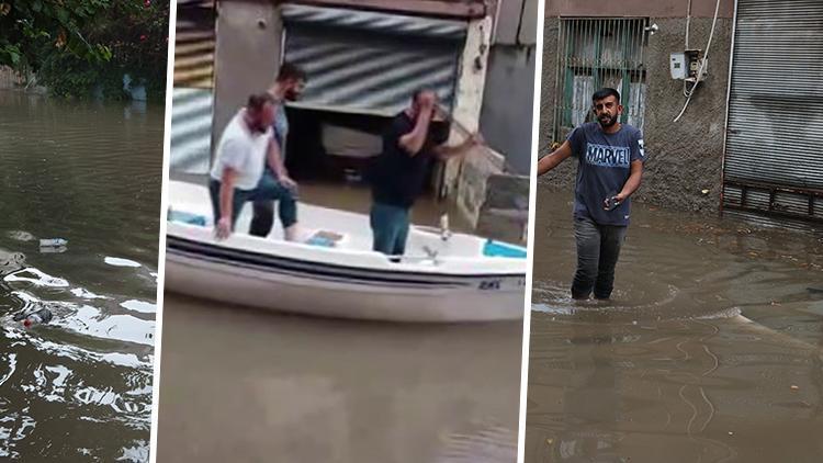 Sağanakla birlikte sokakları su bastı, vatandaşlar 'kayık turuna' çıktı